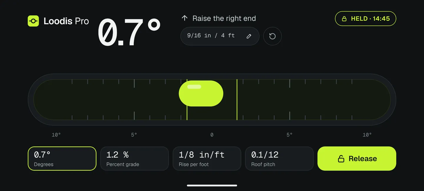 Held edge reading in Loodis: tube level at 0.7°, raise the right end 9/16 in over 4 ft